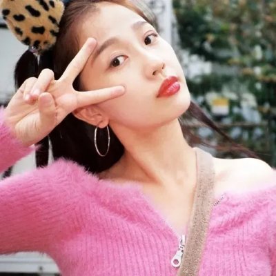 桃花含露又春风